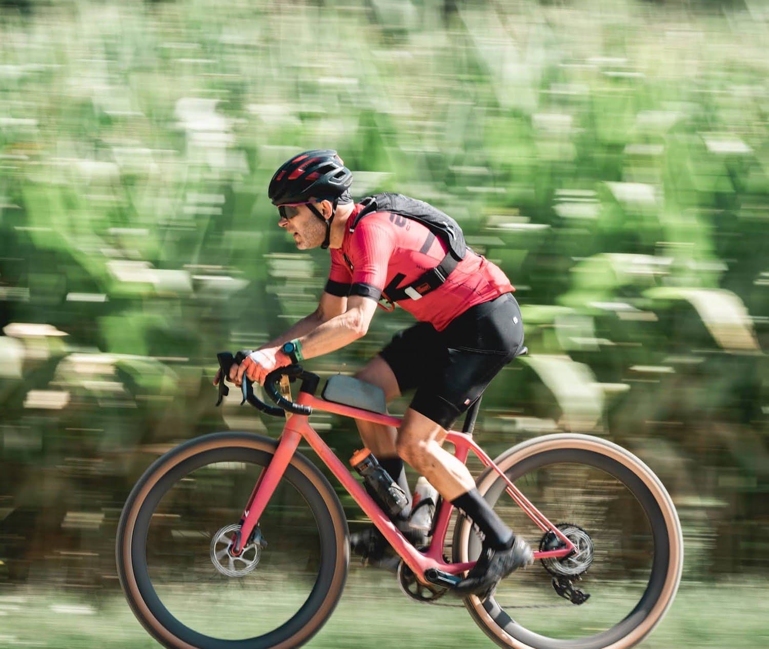 Tom mid-race, motion-blurred forest behind.